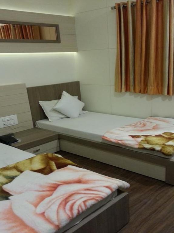 Hotel Oasis Mumbai Szoba fotó