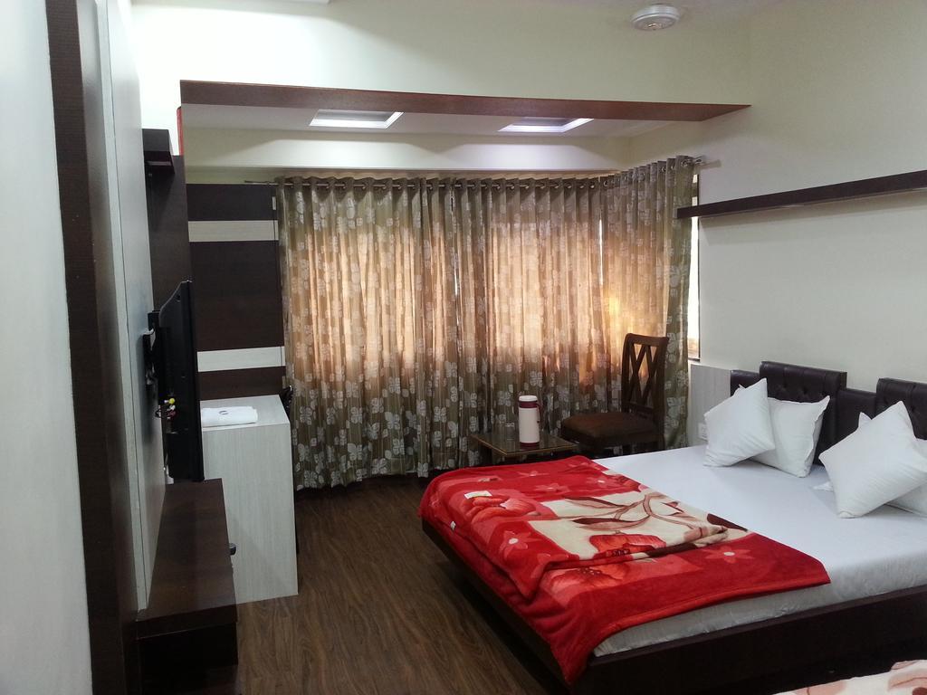 Hotel Oasis Mumbai Szoba fotó