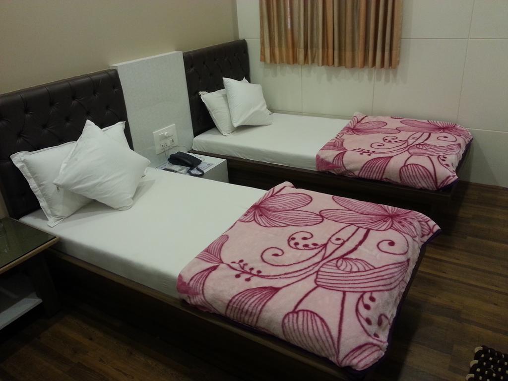 Hotel Oasis Mumbai Szoba fotó