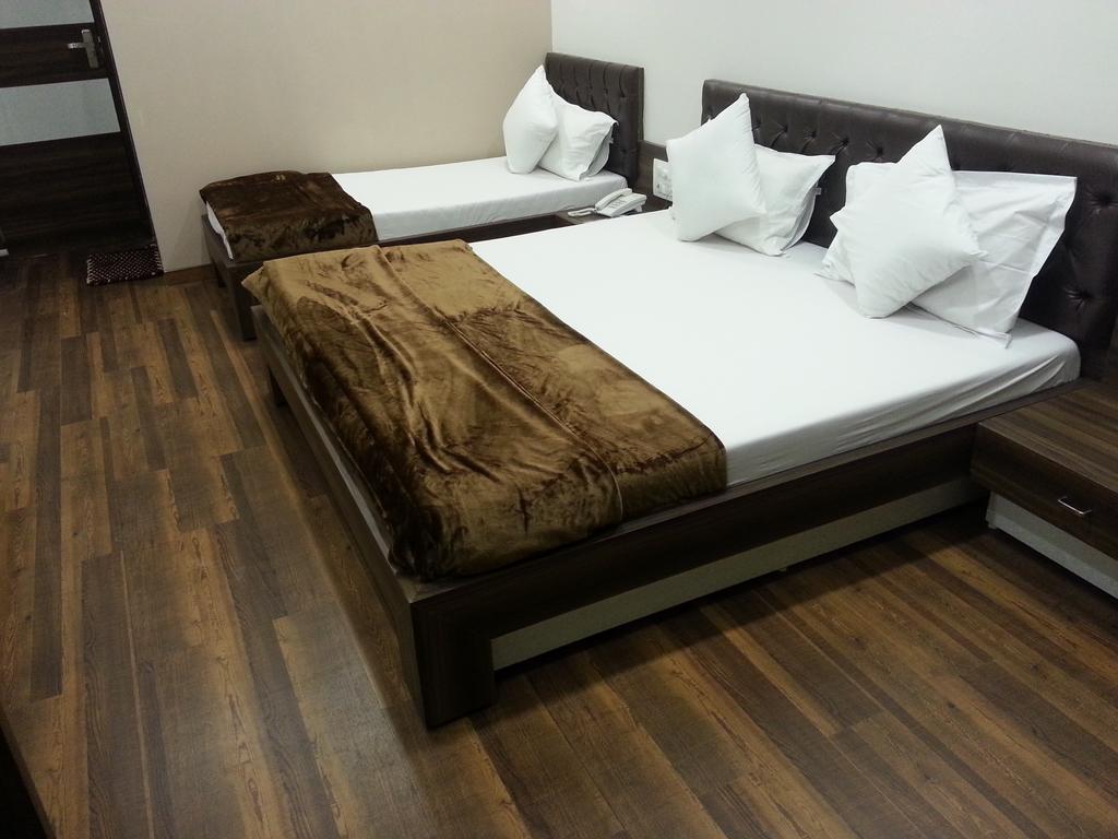Hotel Oasis Mumbai Szoba fotó